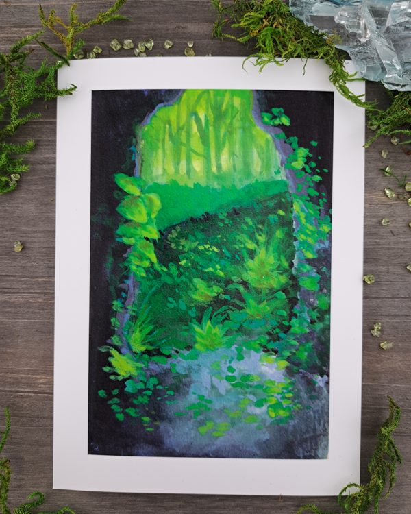 An image of a 5"x7" mini print surrounded by crystals and moss. The mini print features a vertical landscape with foliage flowing into a cave exit (portal) as you look outside from it, which was painted with acrylic inks.